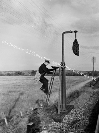 WORKER HANGS UP THE MAILBAG